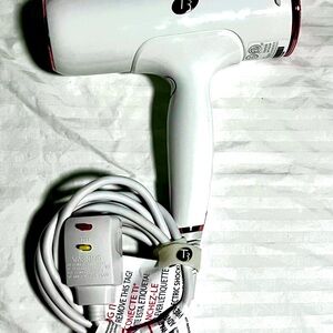 T3 Model 76820 White Hair Dryer with rose gold Accents